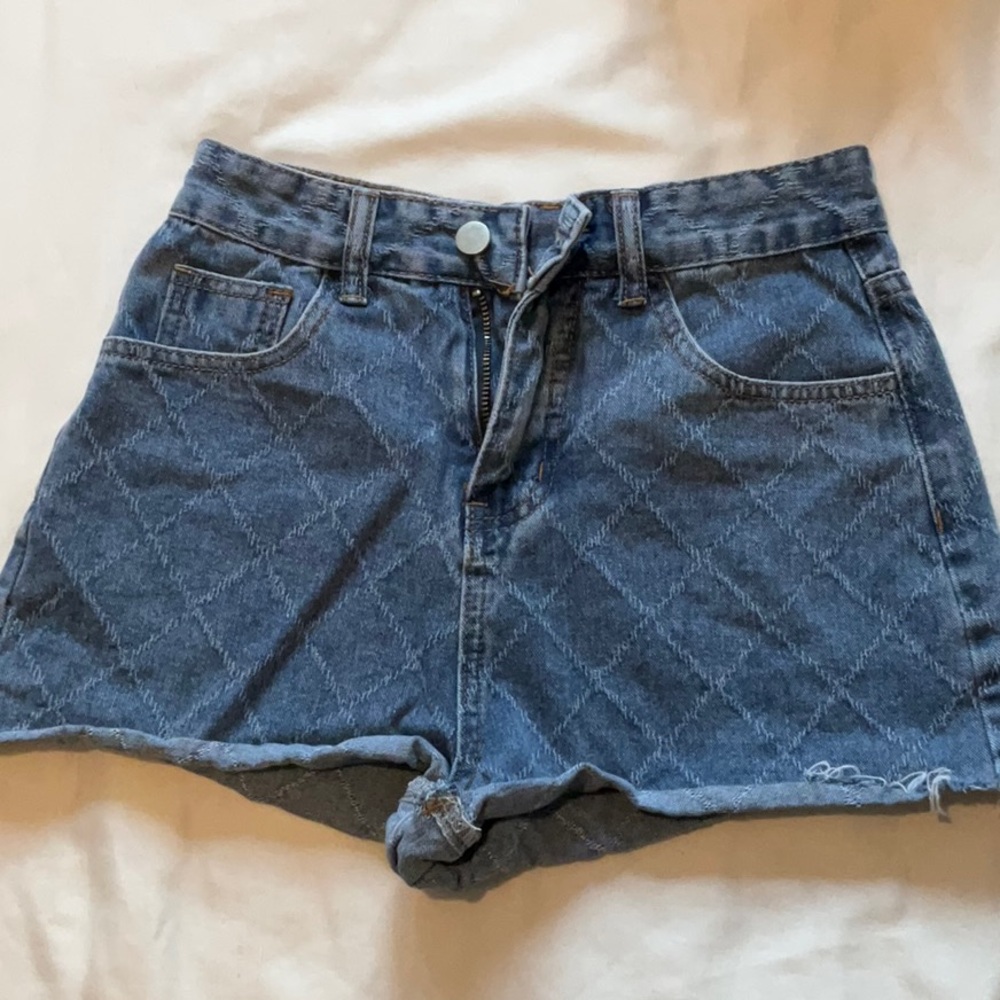 Blue Jean Shorts with Raw Hem and Vintage Look